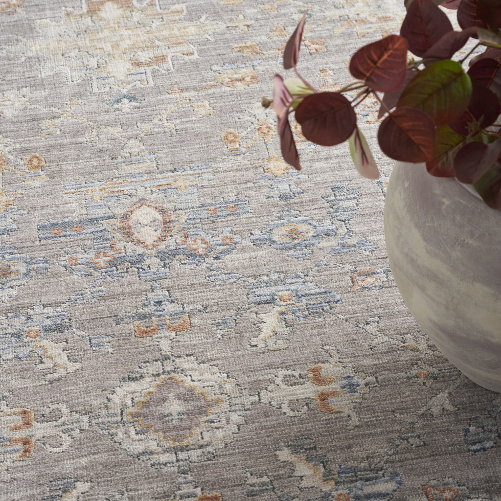 8" X 10" Ivory Blue and Gray Oriental Power Loom Distressed Area Rug With Fringe