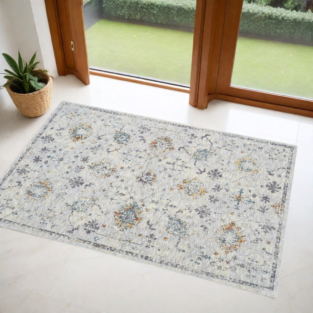 2" X 3" Ivory and Blue Floral Area Rug