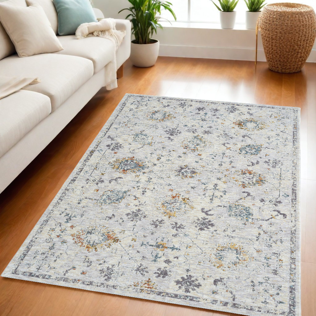 5" X 8" Ivory and Blue Floral Area Rug