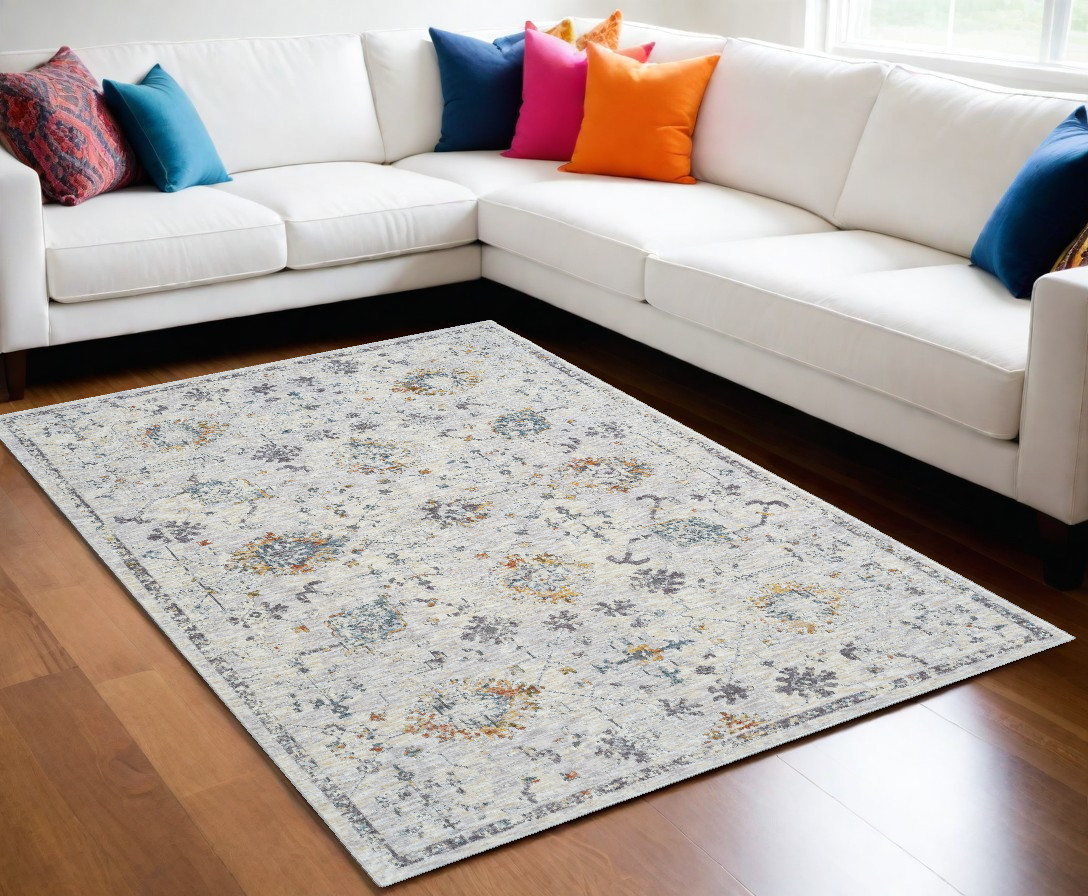 9" X 12" Ivory and Blue Floral Area Rug