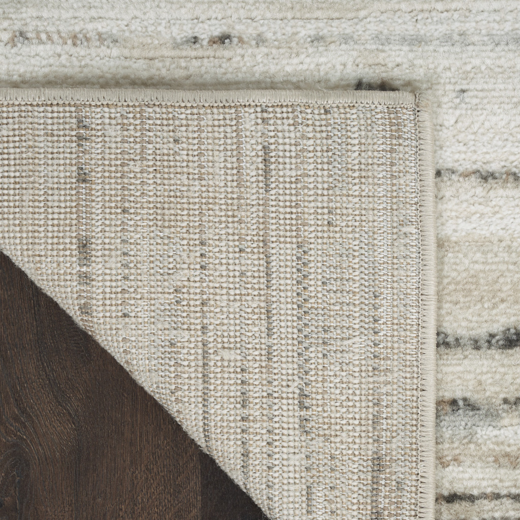 5" X 7" Cream Abstract Distressed Area Rug
