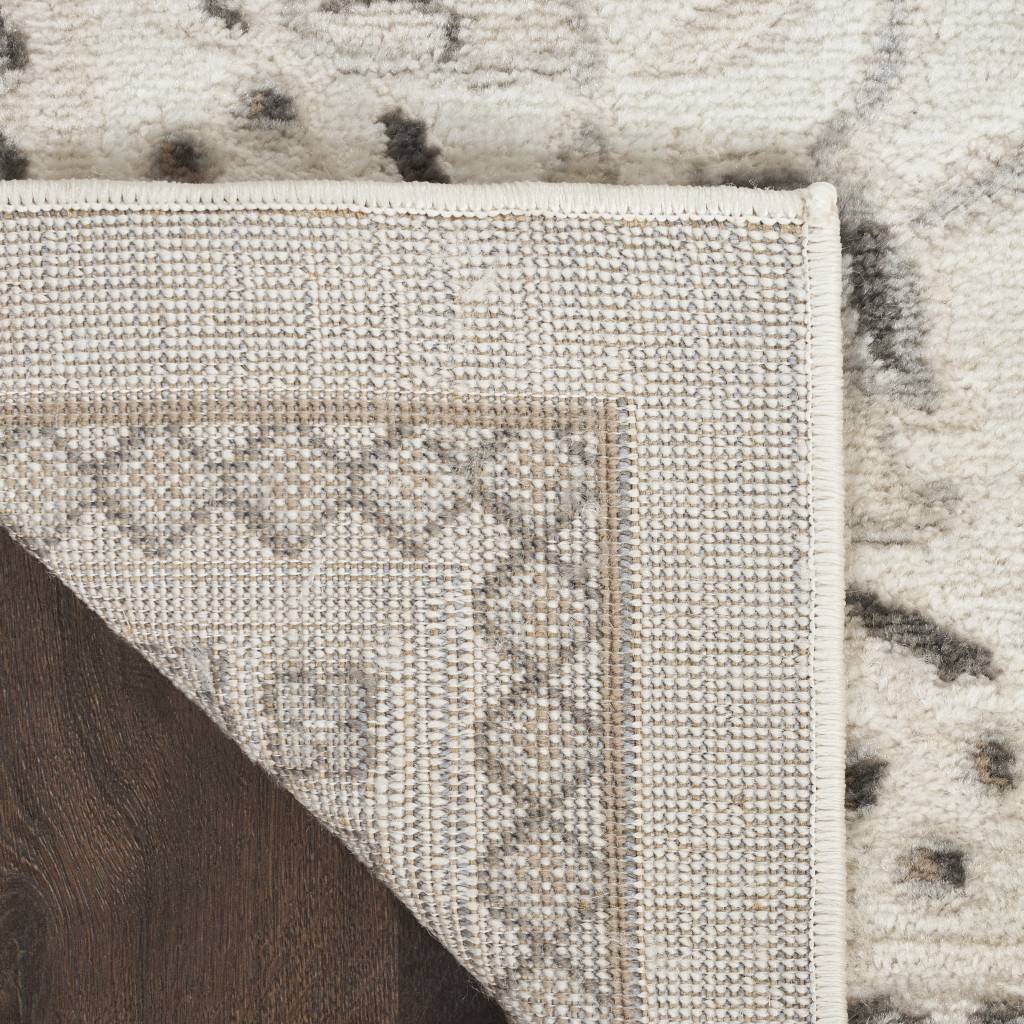5" X 7" Cream Floral Distressed Area Rug