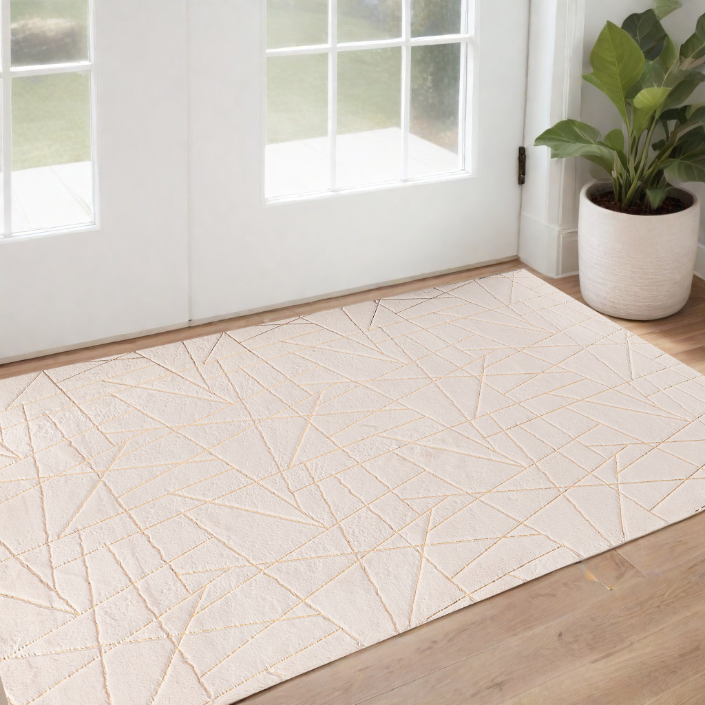 2" X 3" Beige and Gold Faux Fur Abstract Shag Non Skid Area Rug