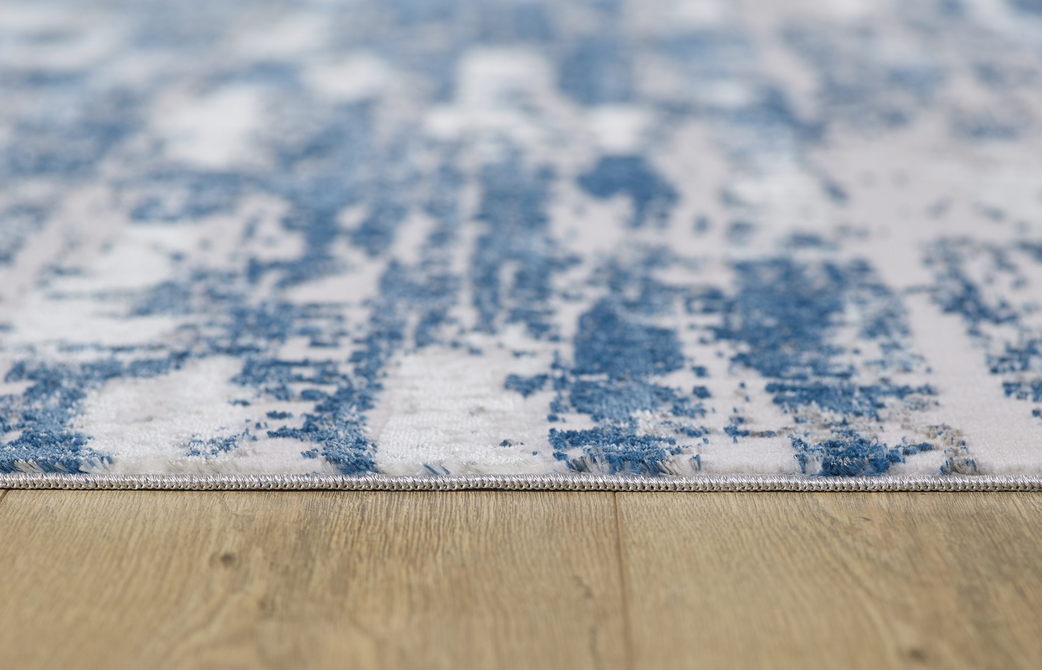 10" Blue and Ivory Abstract Washable Non Skid Area Rug