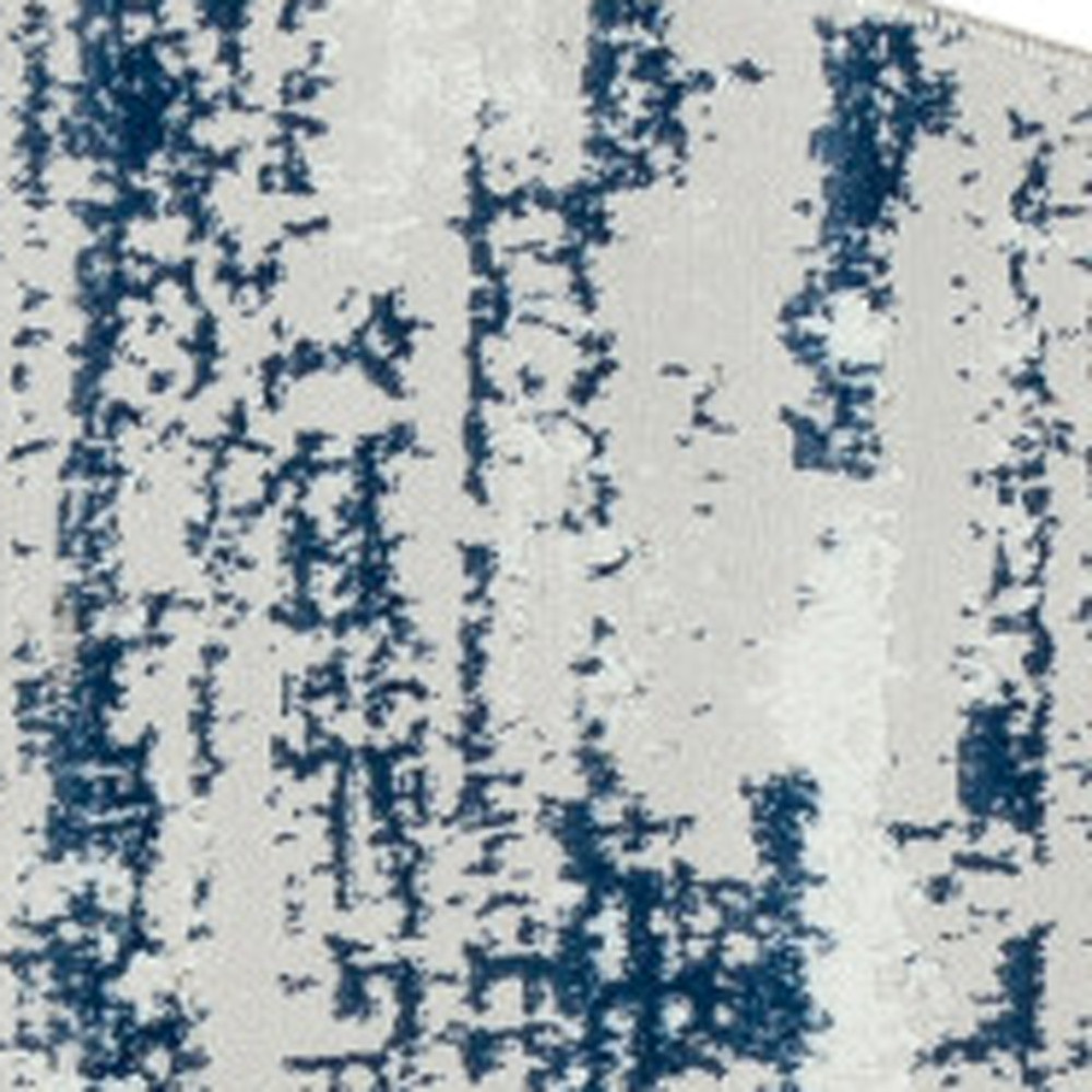 4" Blue and Ivory Round Abstract Washable Non Skid Area Rug