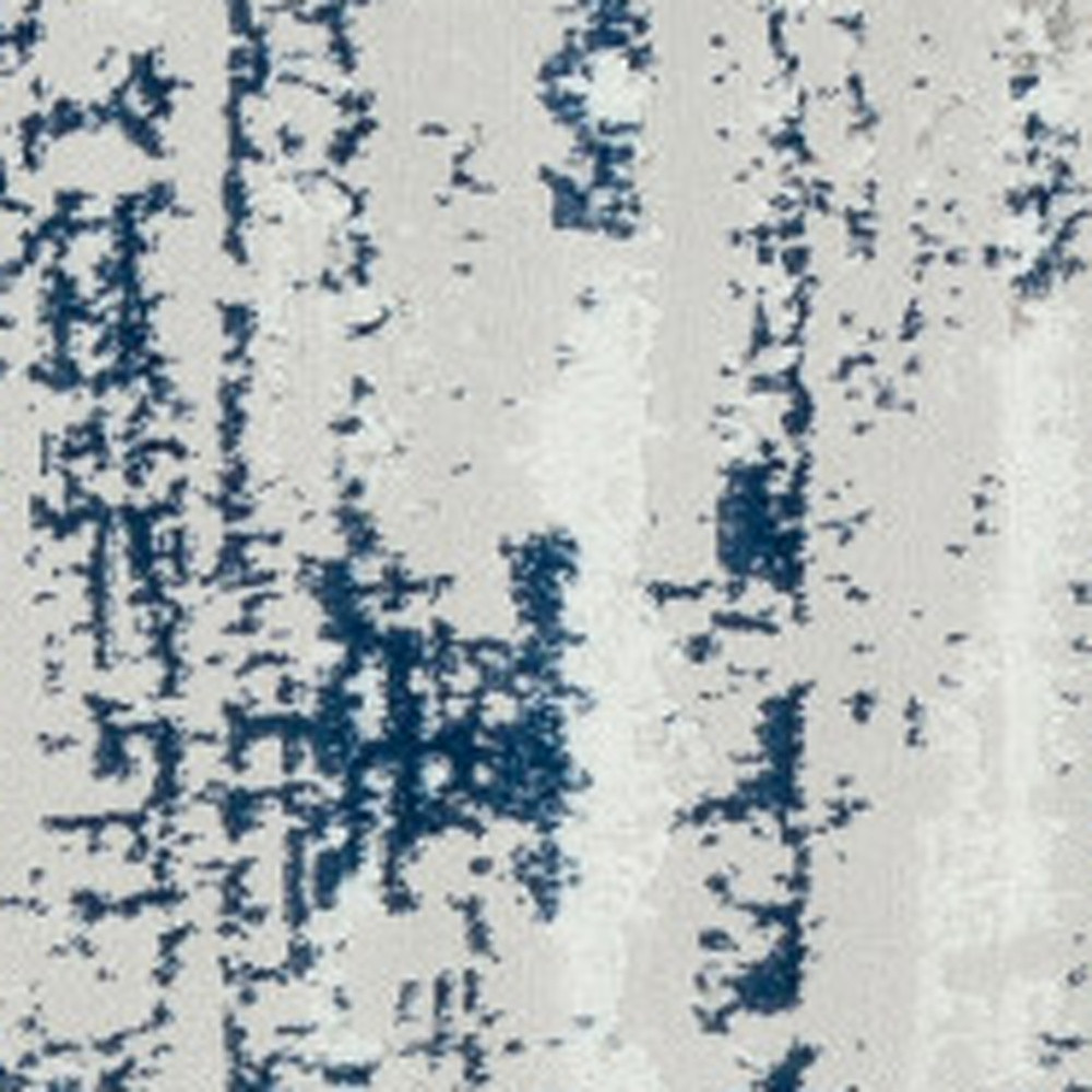 7" Blue and Ivory Round Abstract Washable Non Skid Area Rug