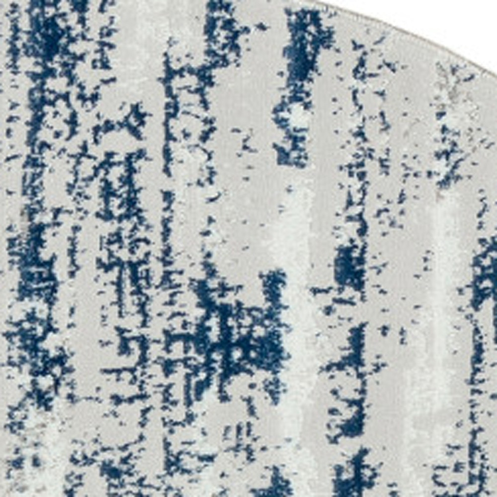 7" Blue and Ivory Round Abstract Washable Non Skid Area Rug