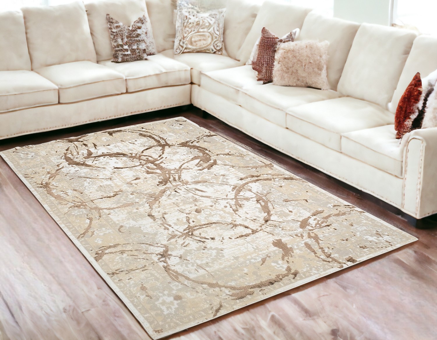 5" X 8" Beige and Gold Abstract Area Rug