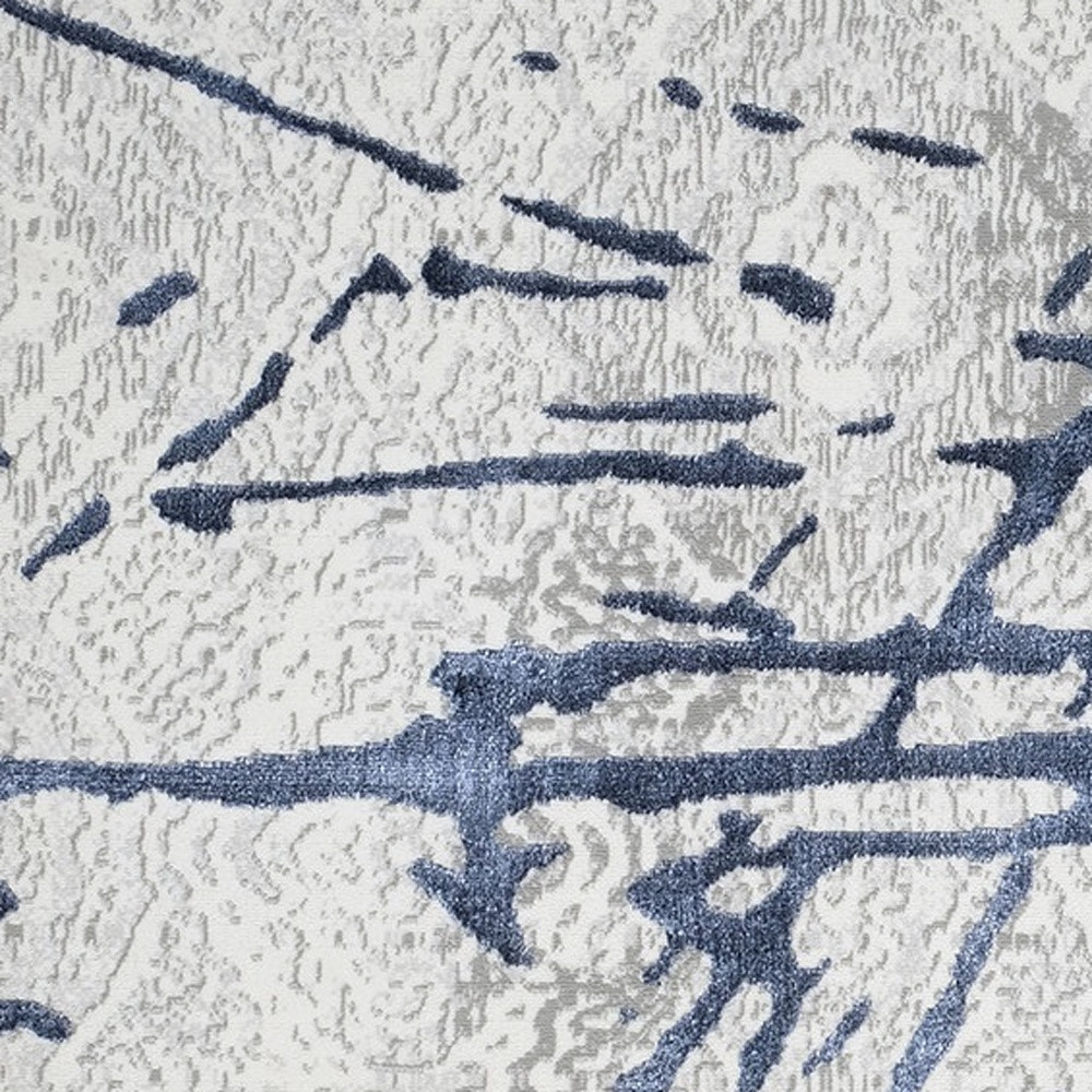 5" X 8" Ivory and Blue Abstract Area Rug