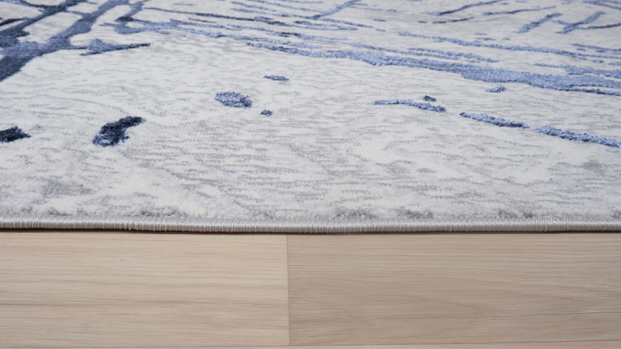 5" X 8" Ivory and Blue Abstract Area Rug