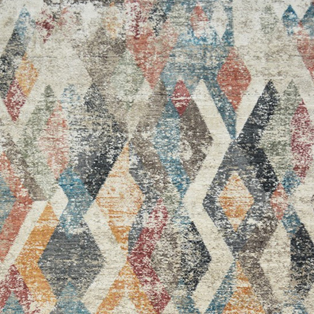 2" X 3" Beige Blue and Gray Geometric Distressed Area Rug With Fringe