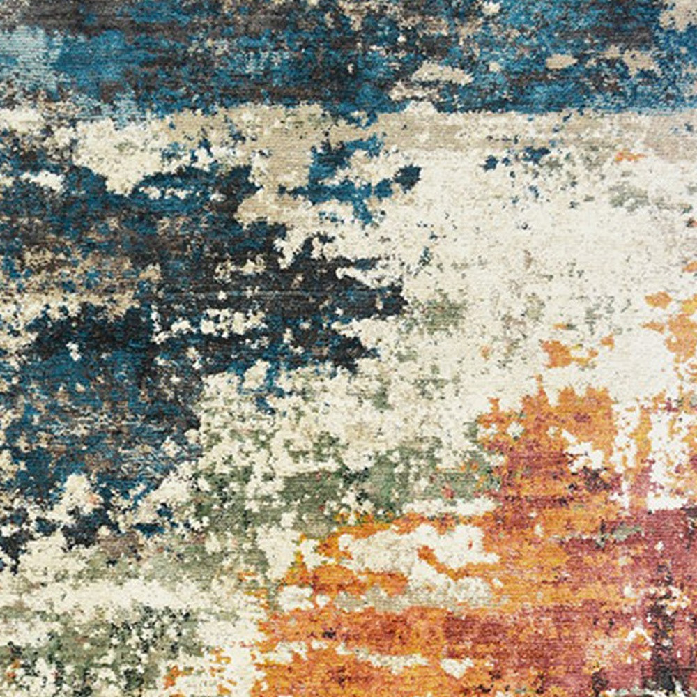 2" X 3" Beige Blue and Ivory Abstract Distressed Area Rug With Fringe