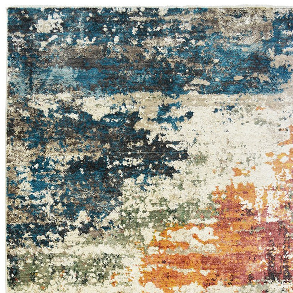 2" X 3" Beige Blue and Ivory Abstract Distressed Area Rug With Fringe