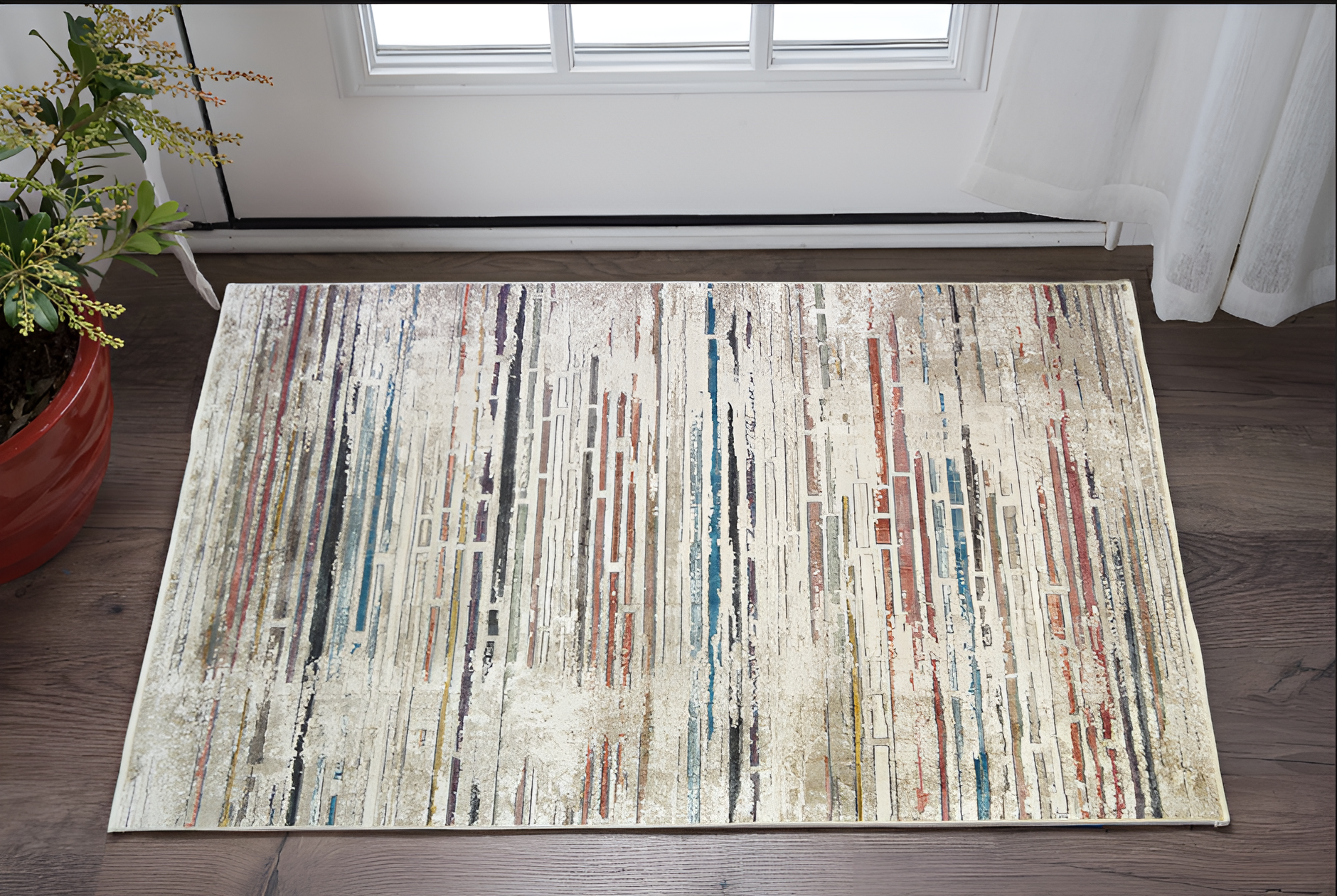 2" X 3" Beige Geometric Distressed Area Rug With Fringe