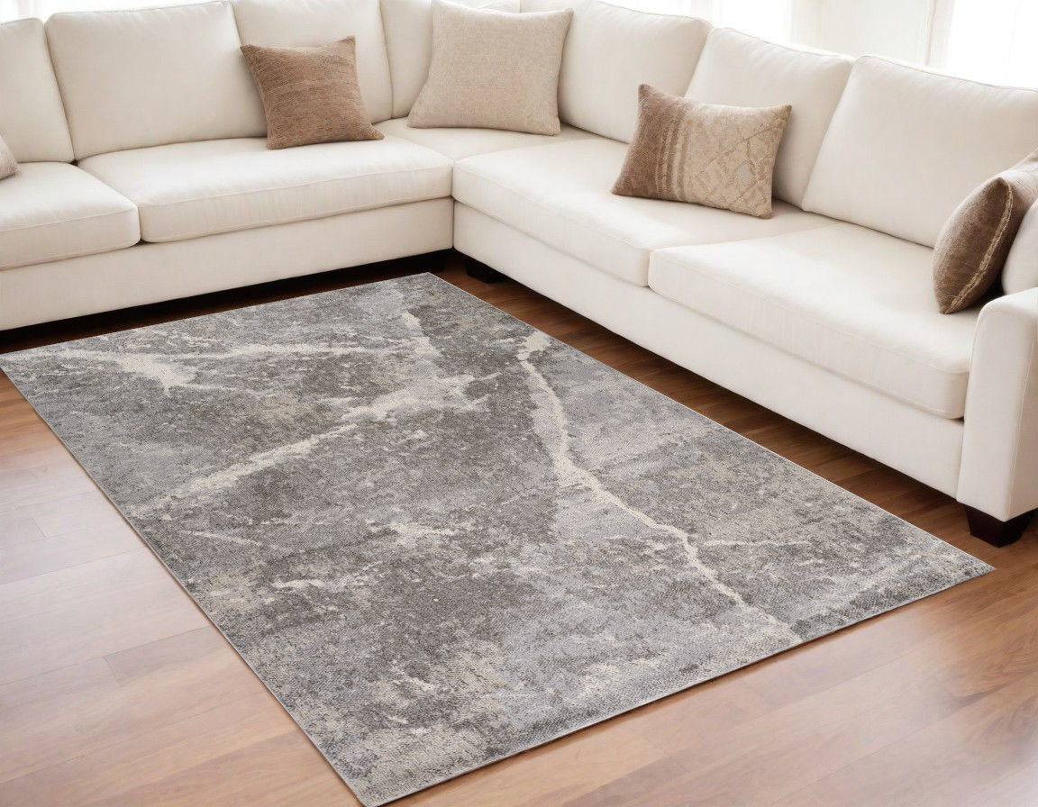 5" X 8" Gray and Ivory Abstract Area Rug