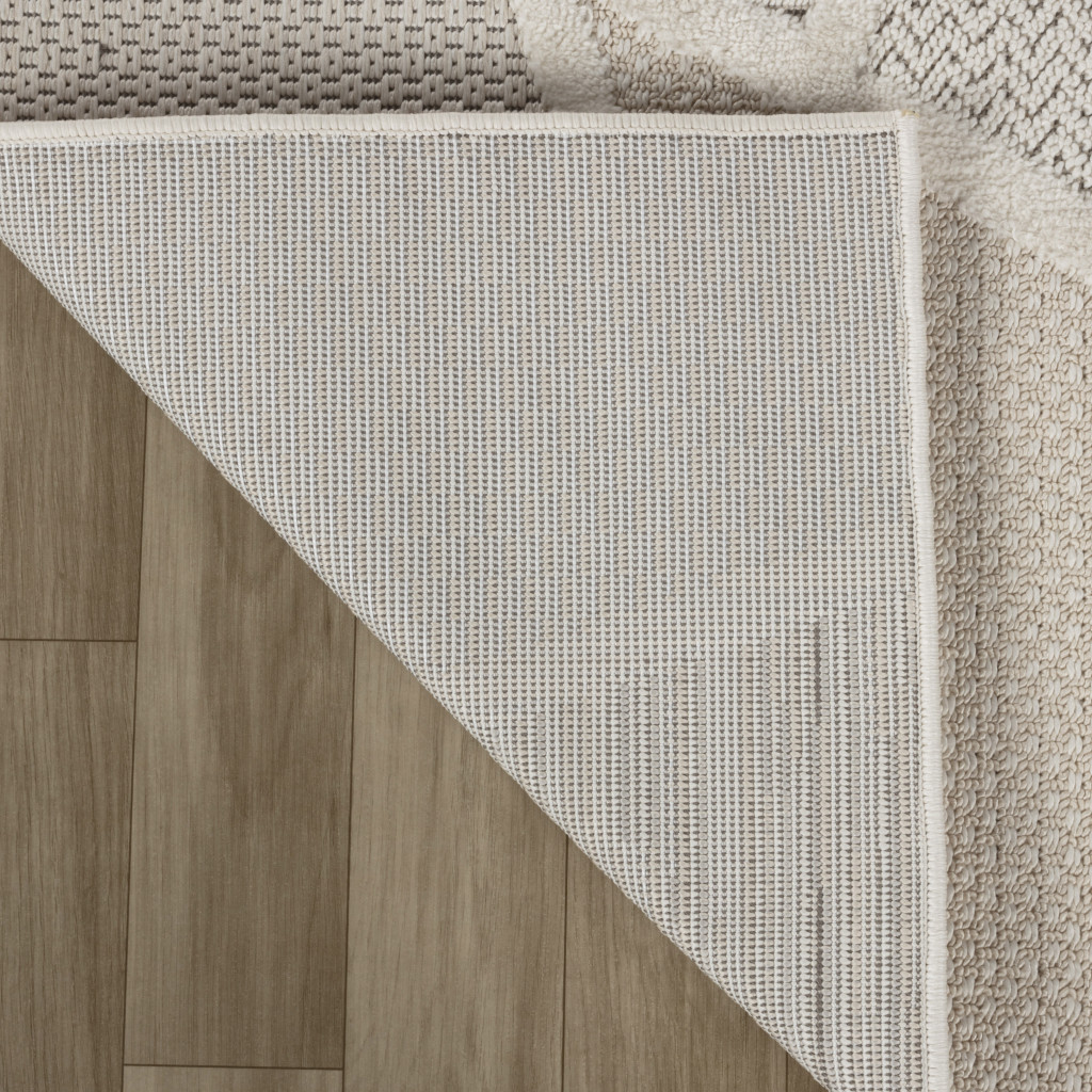 4" X 6" Cream and Beige Geometric Distressed Area Rug