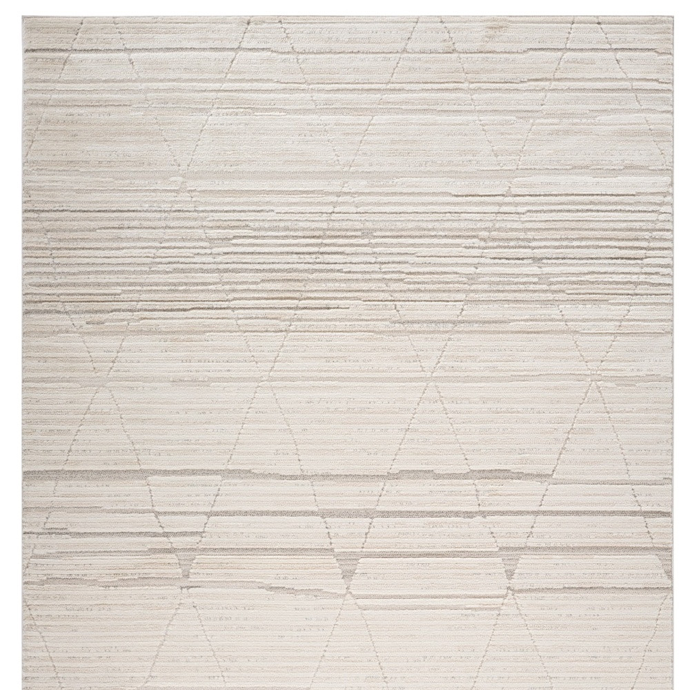 5" X 8" Cream and Beige Geometric Area Rug