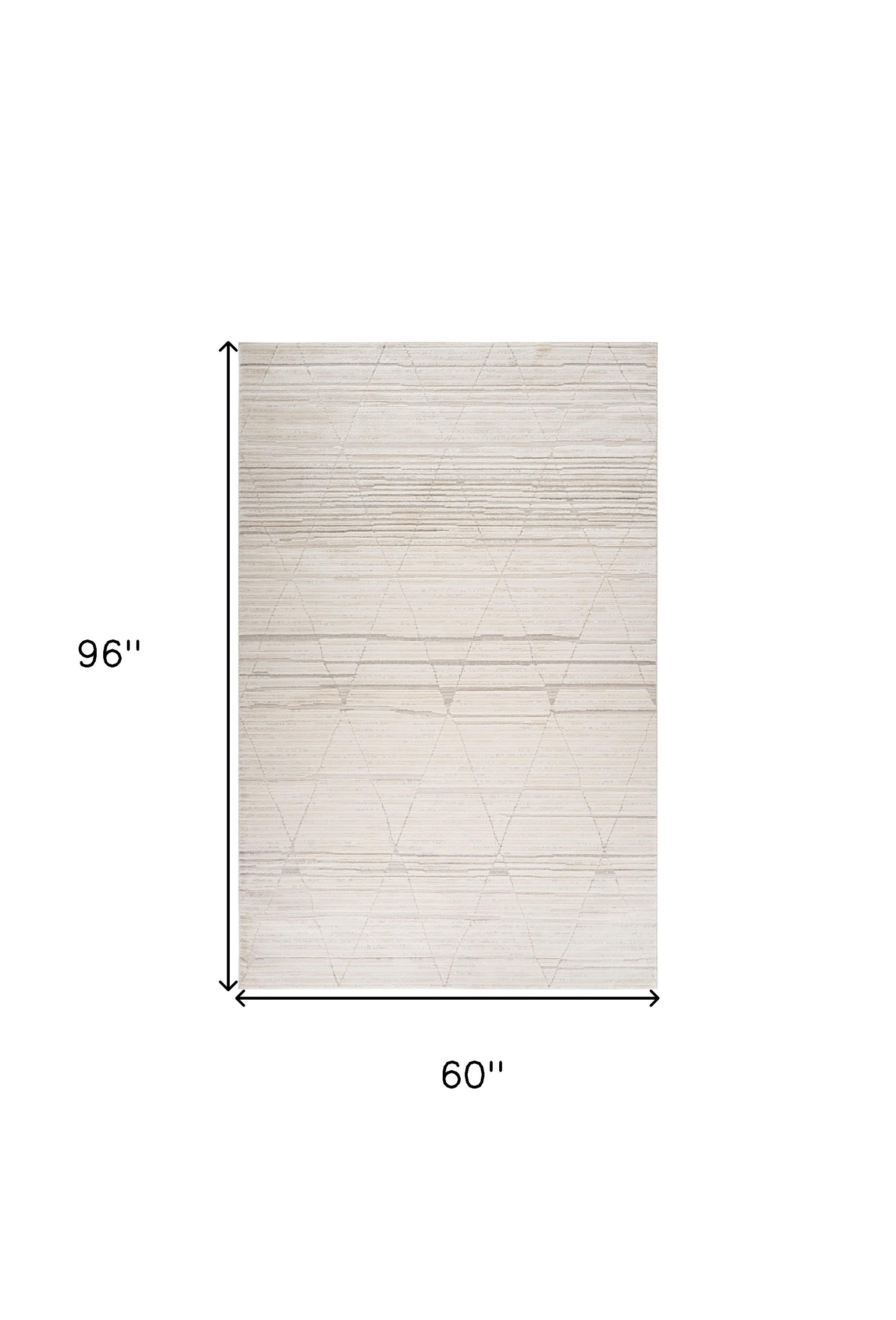 5" X 8" Cream and Beige Geometric Area Rug