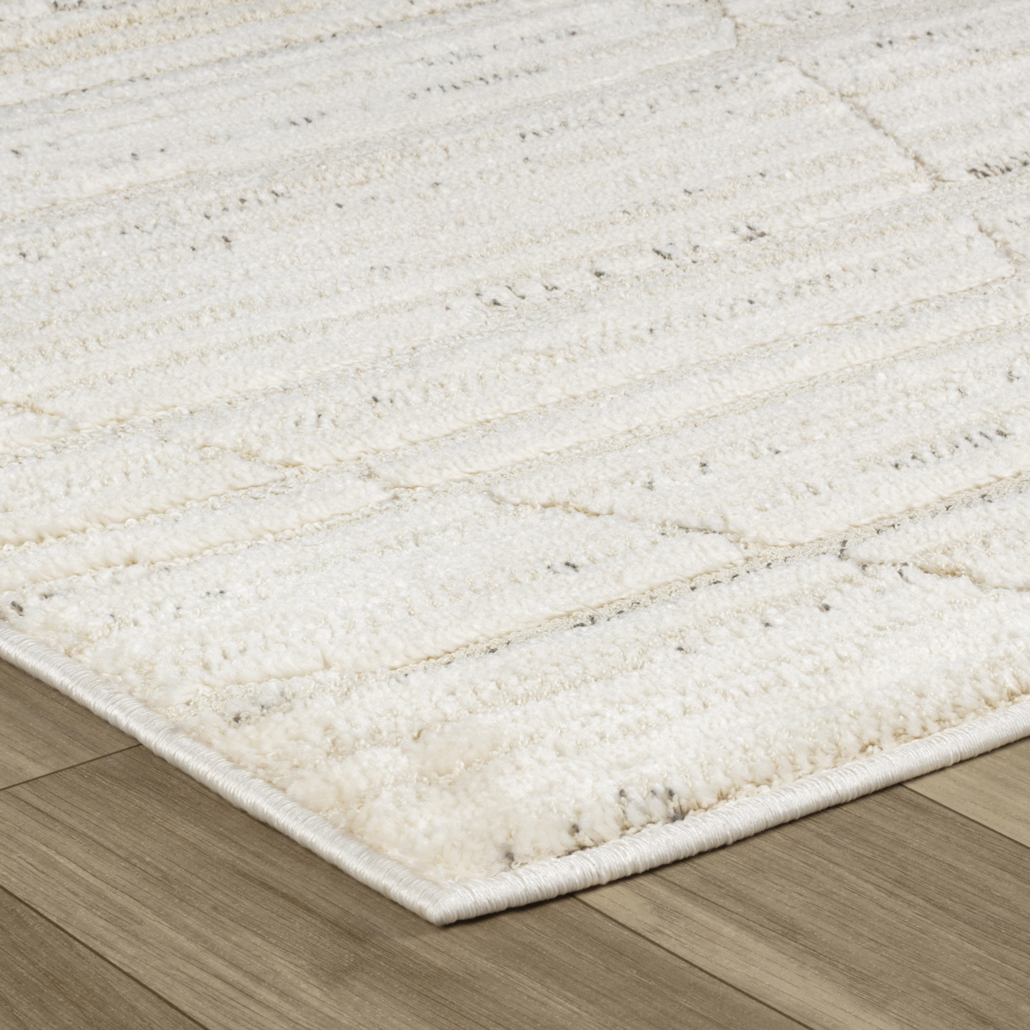 5" X 8" Cream and Beige Geometric Area Rug