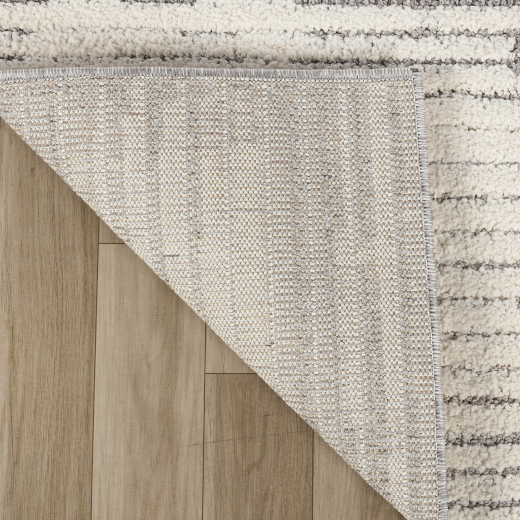 5" X 8" Gray and Cream Abstract Distressed Area Rug