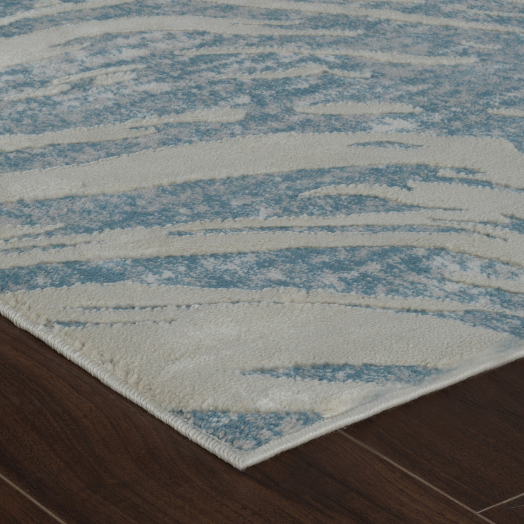 5" X 8" Blue and Beige Abstract Distressed Area Rug