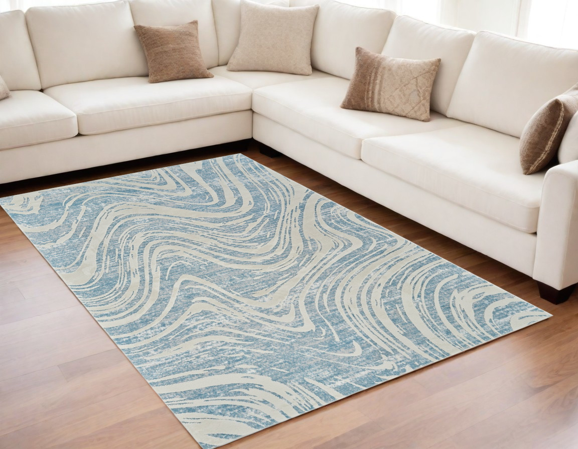 5" X 8" Blue and Beige Abstract Distressed Area Rug