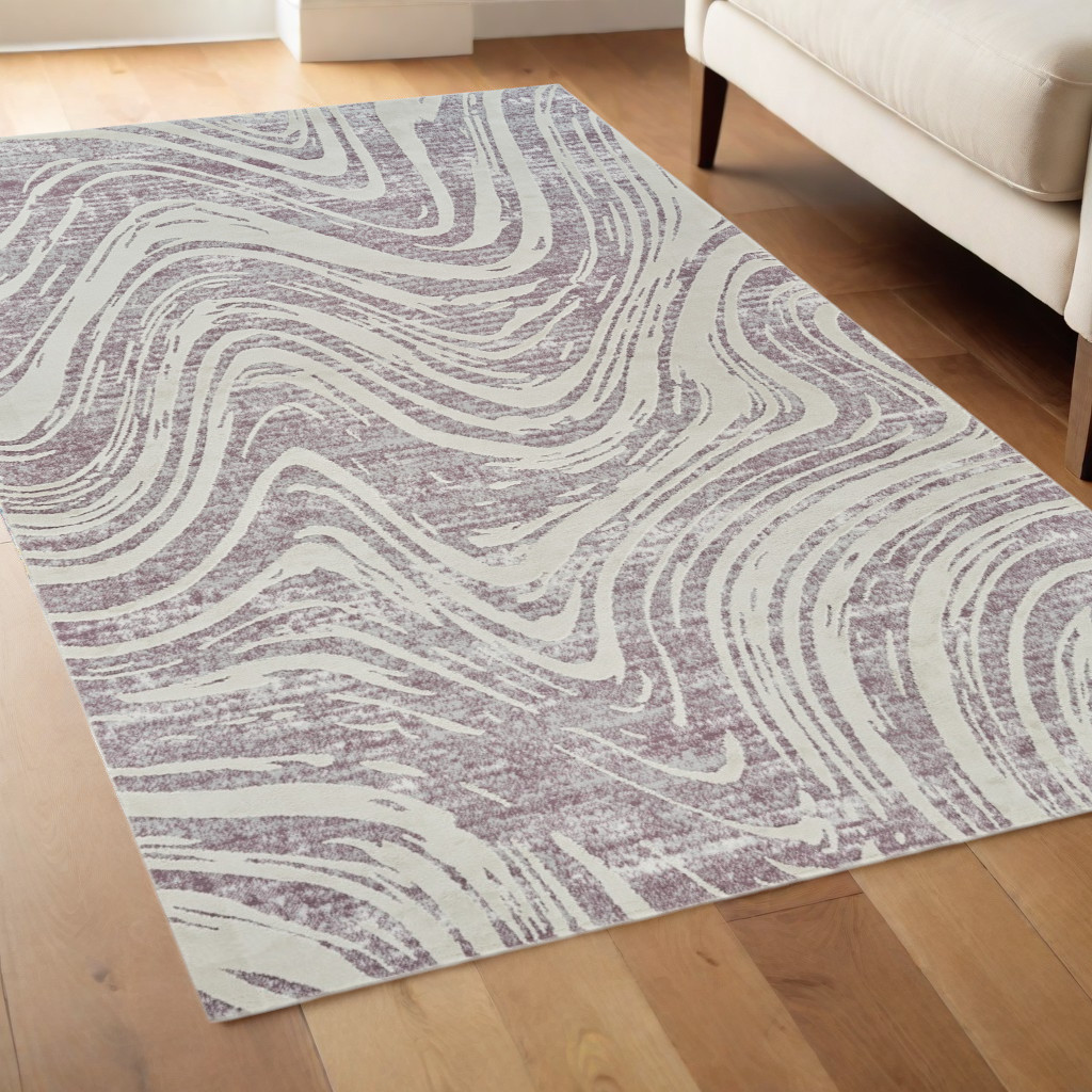4" X 6" Beige and Purple Abstract Distressed Area Rug