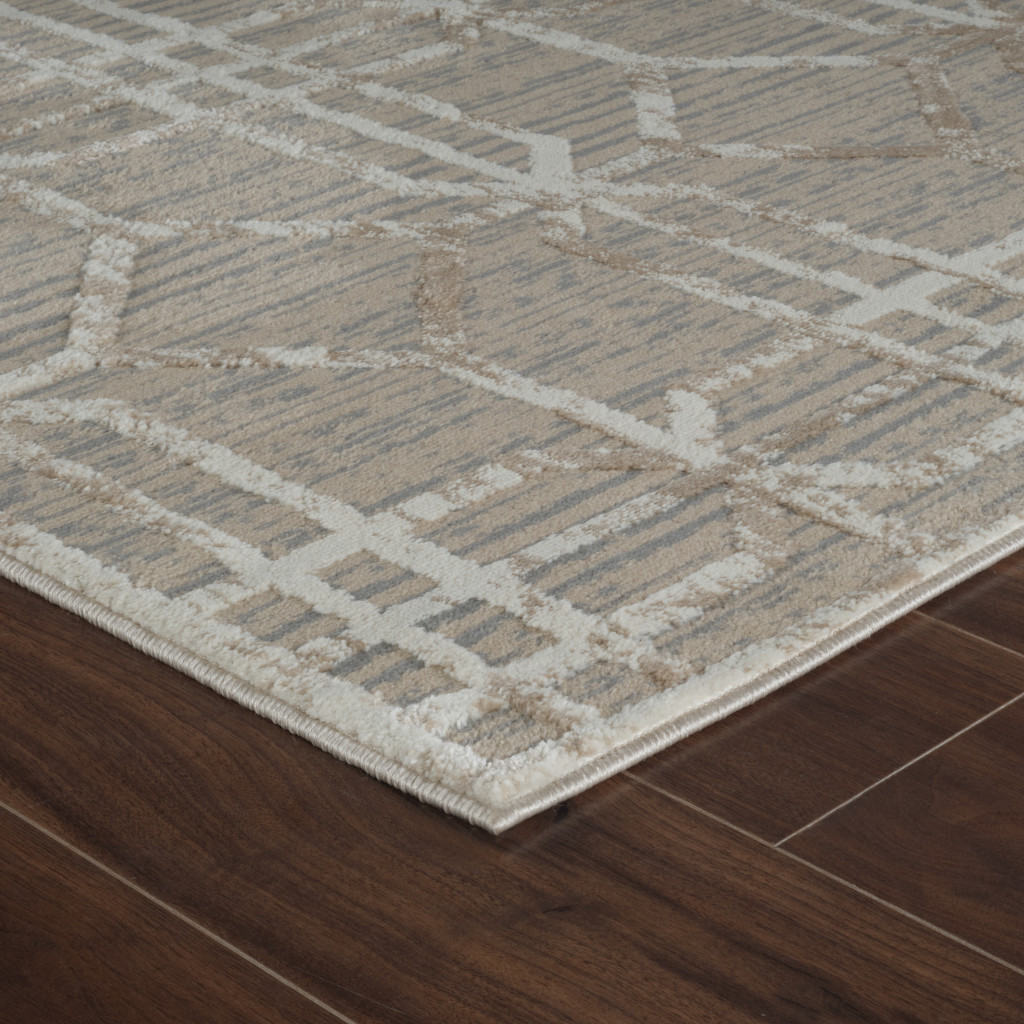 5" X 8" Beige and Brown Abstract Distressed Area Rug