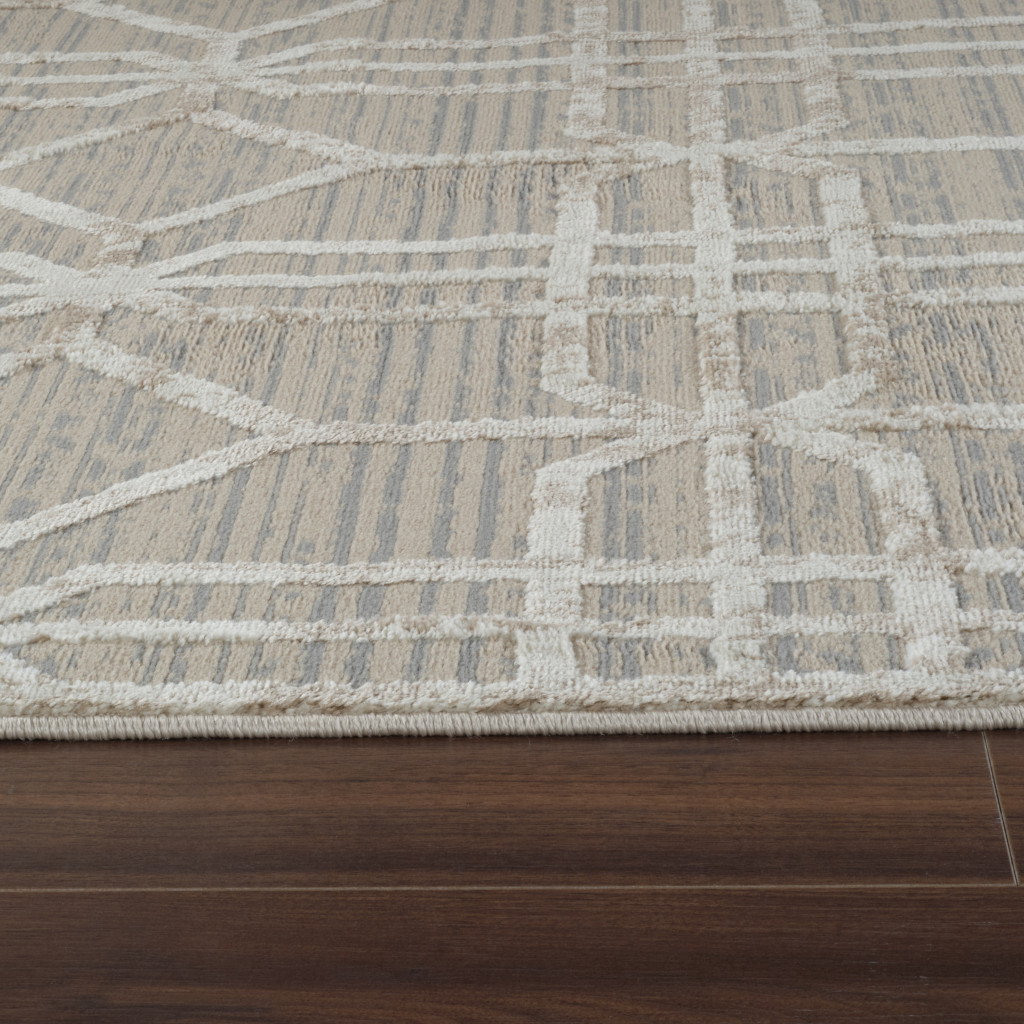 5" X 8" Beige and Brown Abstract Distressed Area Rug