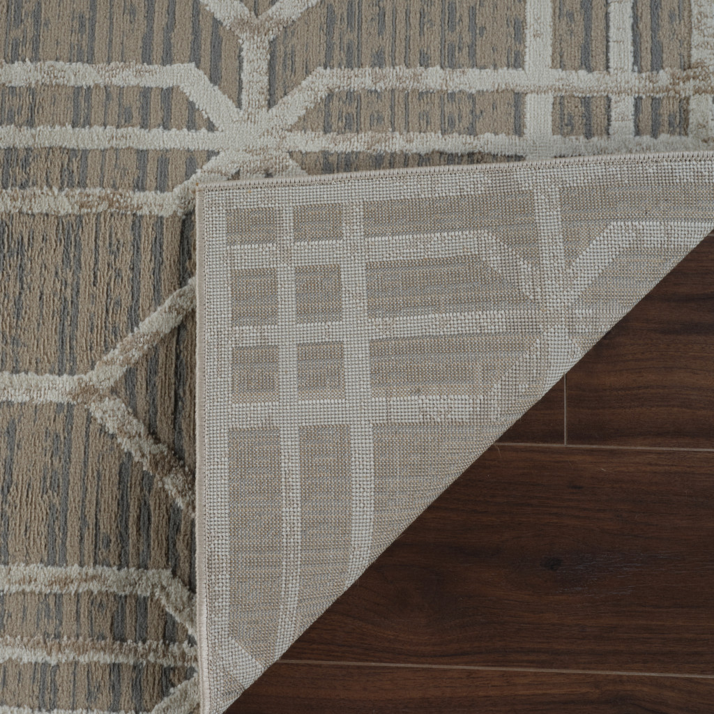 5" X 8" Beige and Brown Abstract Distressed Area Rug