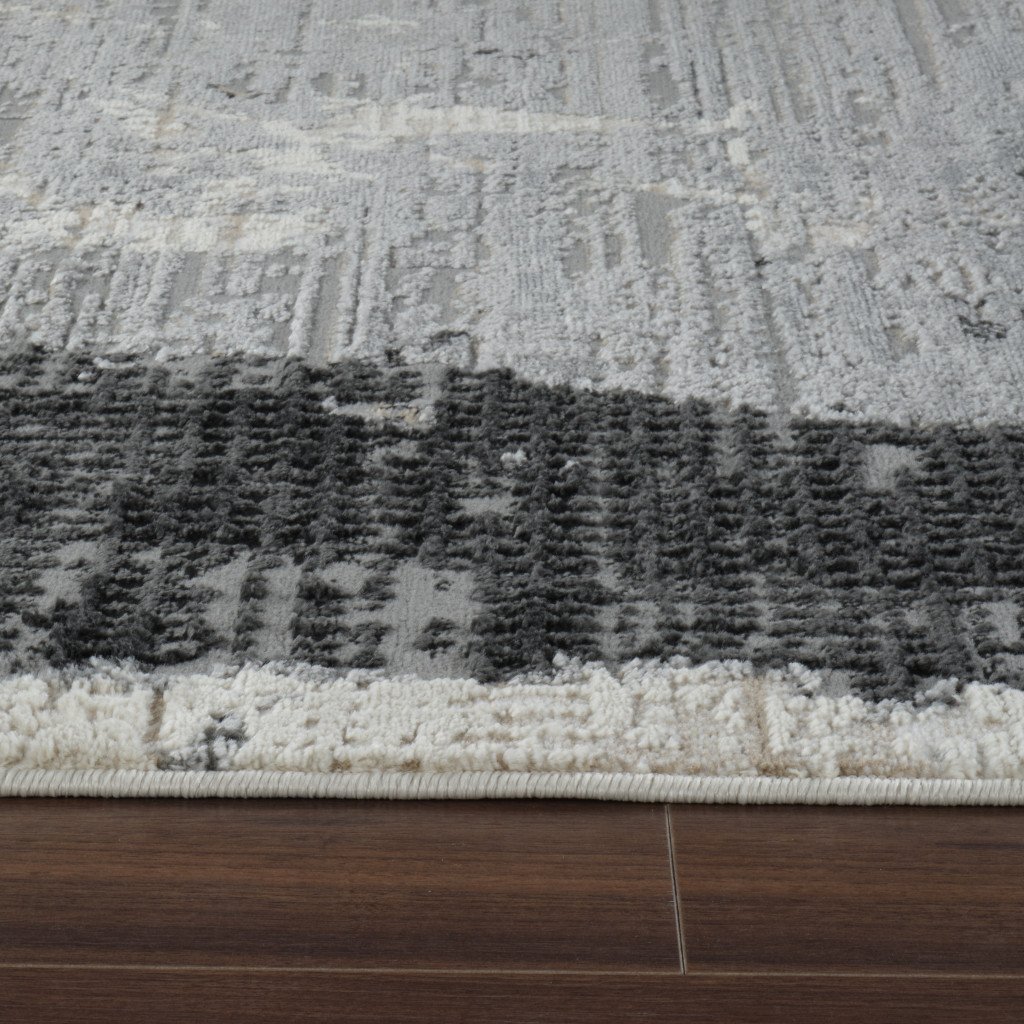 8" X 11" Beige and Black Abstract Distressed Area Rug
