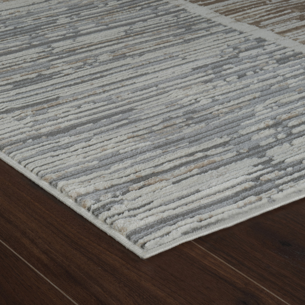 5" X 8" Beige and Brown Abstract Distressed Area Rug