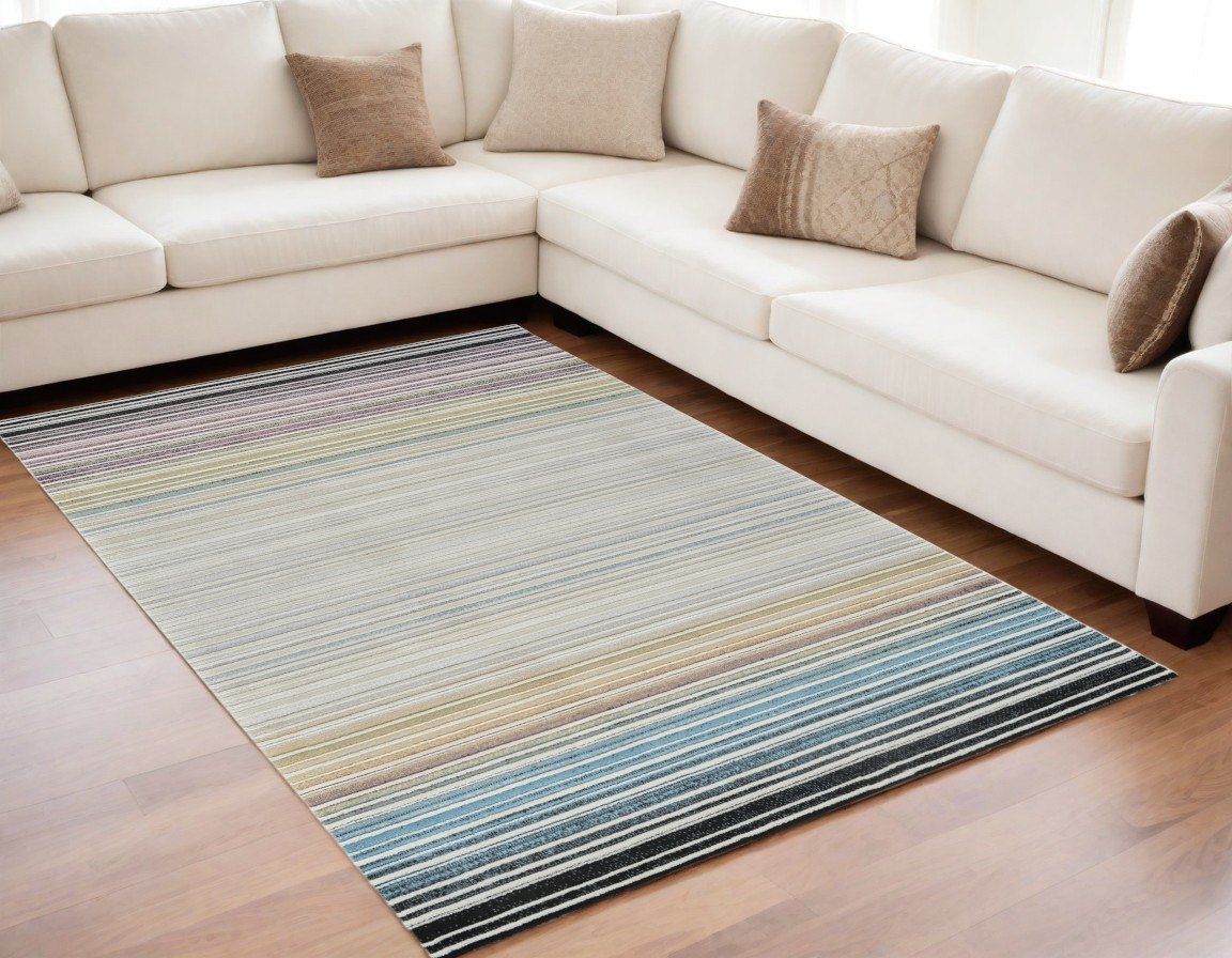 5" X 8" Beige and Blue Abstract Distressed Area Rug