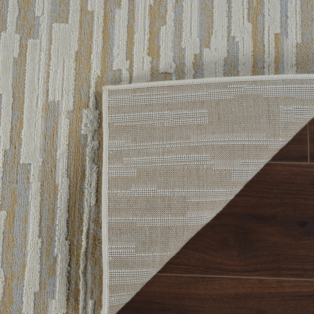 5" X 8" Beige and Brown Abstract Distressed Area Rug
