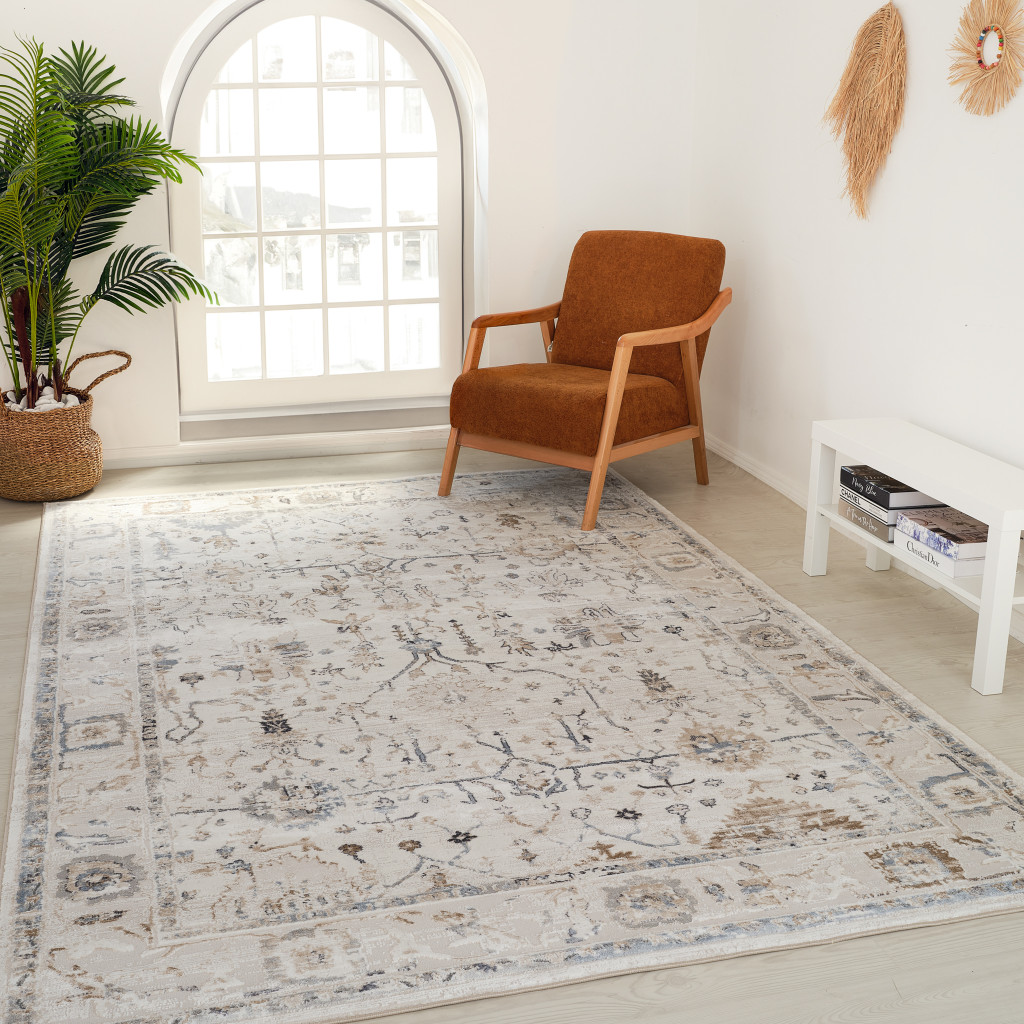 5" X 8" Beige and Ivory Abstract Distressed Area Rug