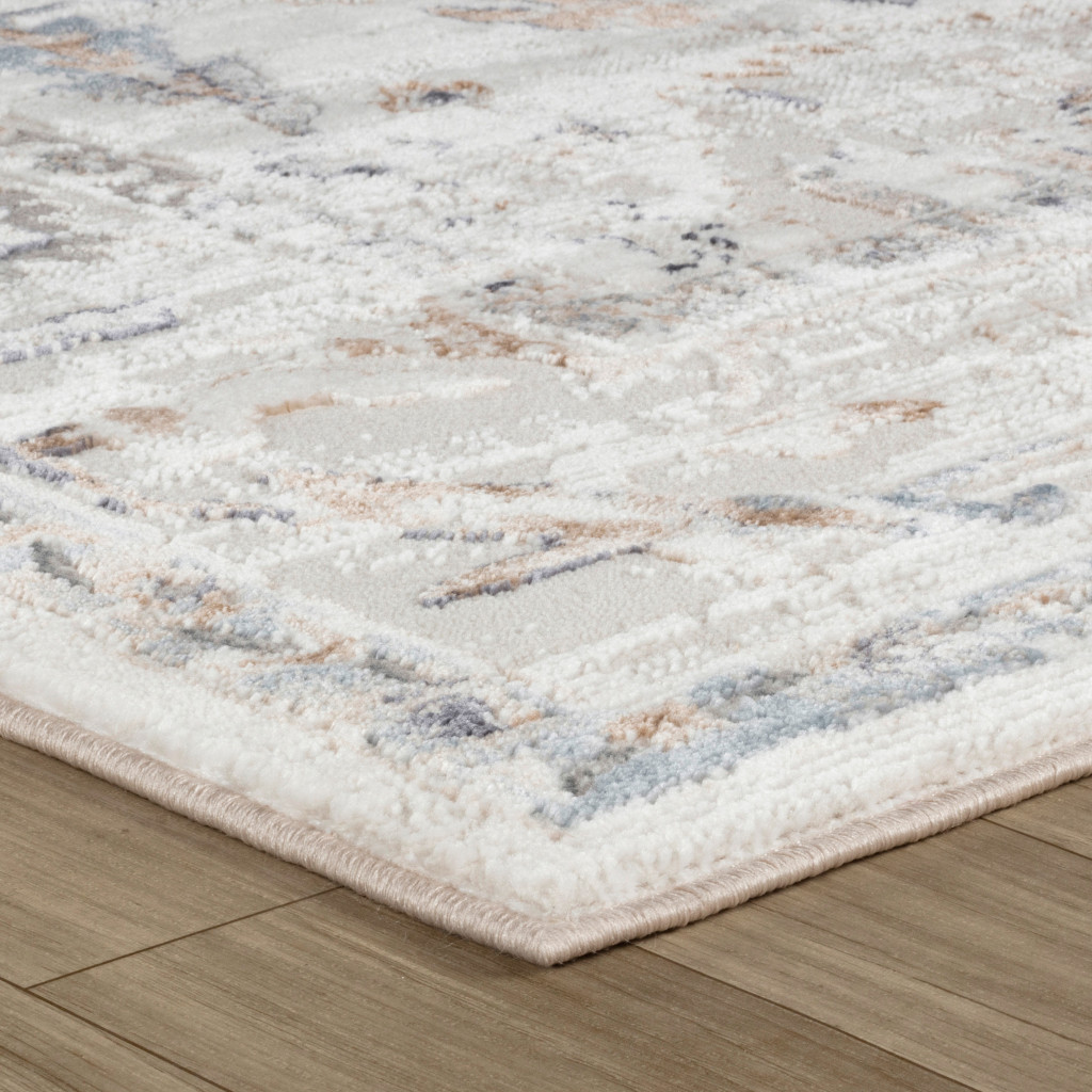 5" X 8" Beige and Ivory Abstract Distressed Area Rug