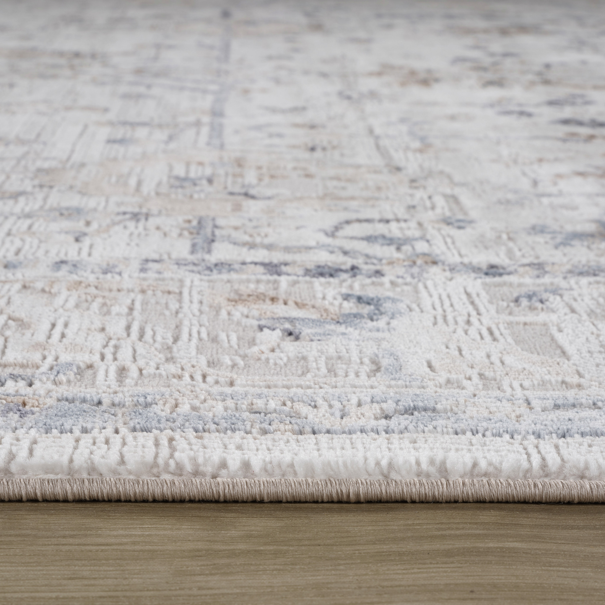 5" X 8" Beige and Ivory Abstract Distressed Area Rug