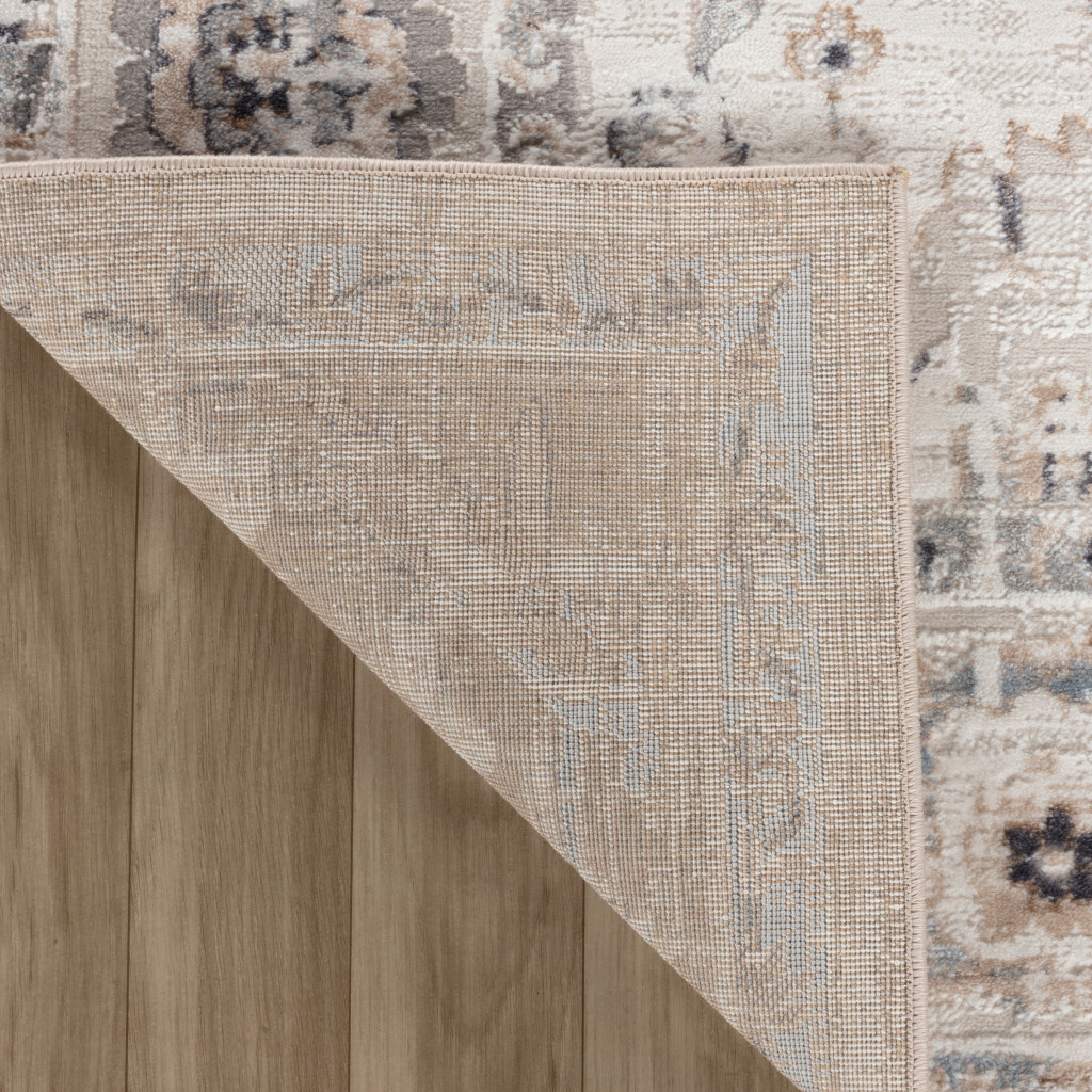 5" X 8" Beige and Ivory Abstract Distressed Area Rug
