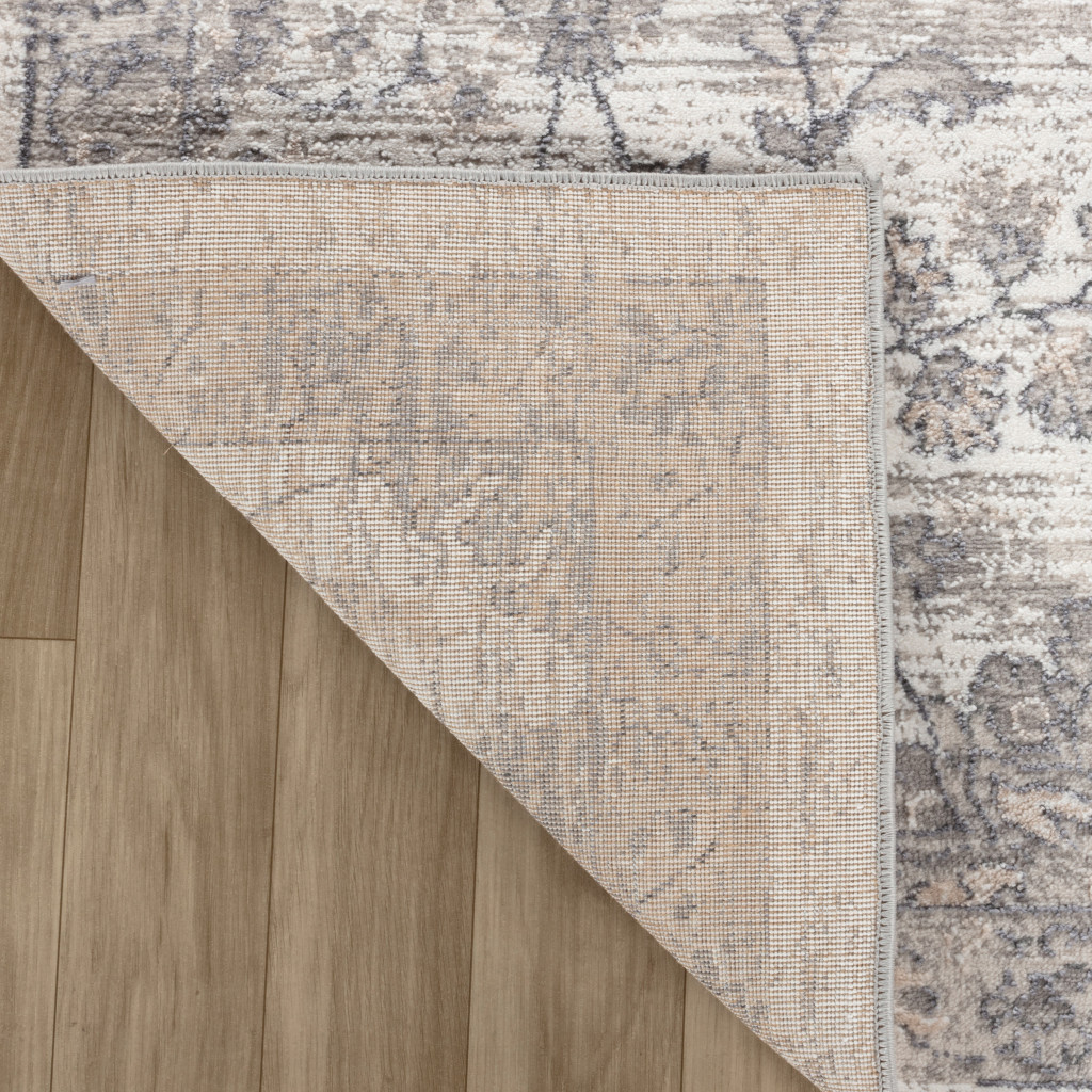 4" X 6" Beige and Gray Floral Distressed Area Rug