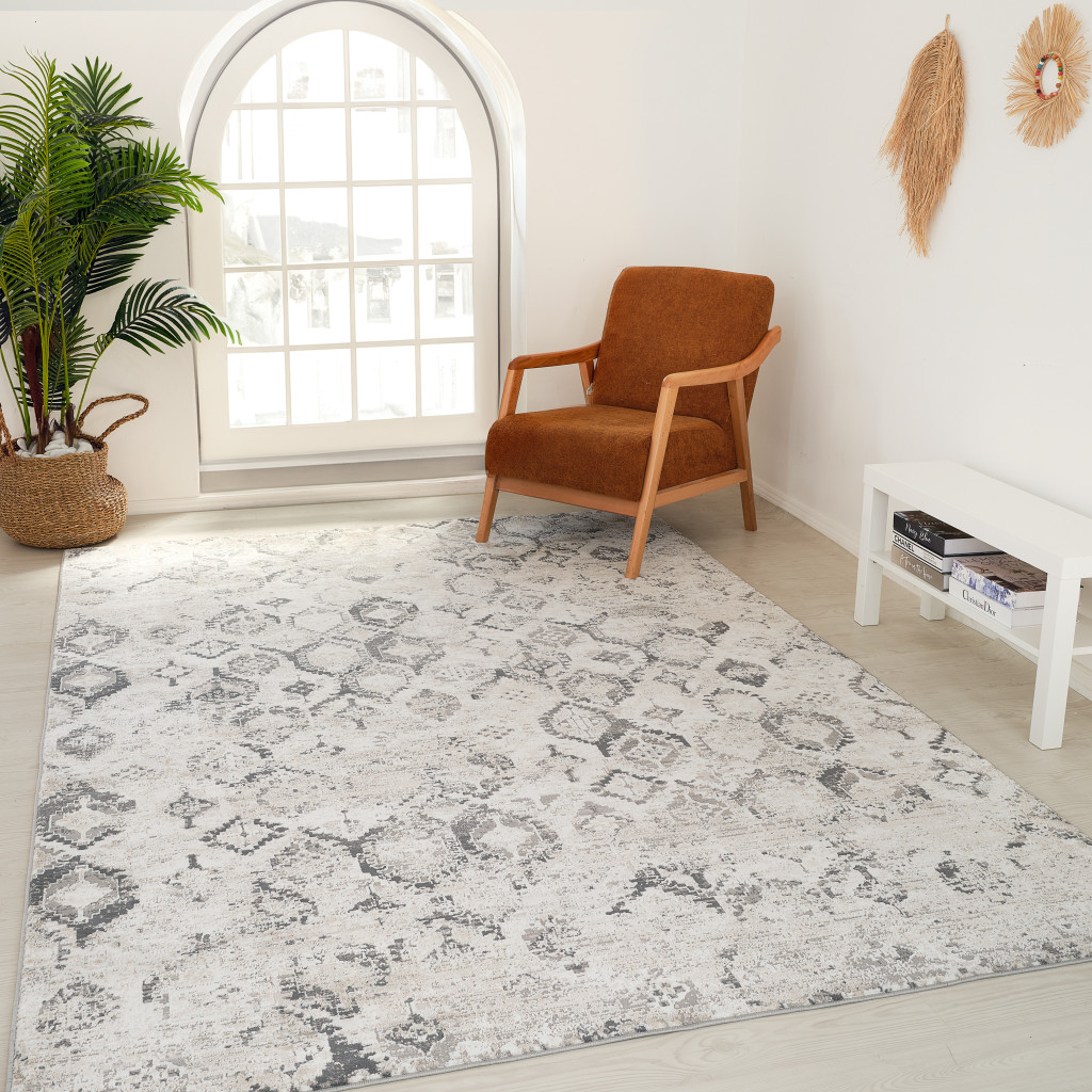 5" X 8" Beige and Gray Abstract Distressed Area Rug