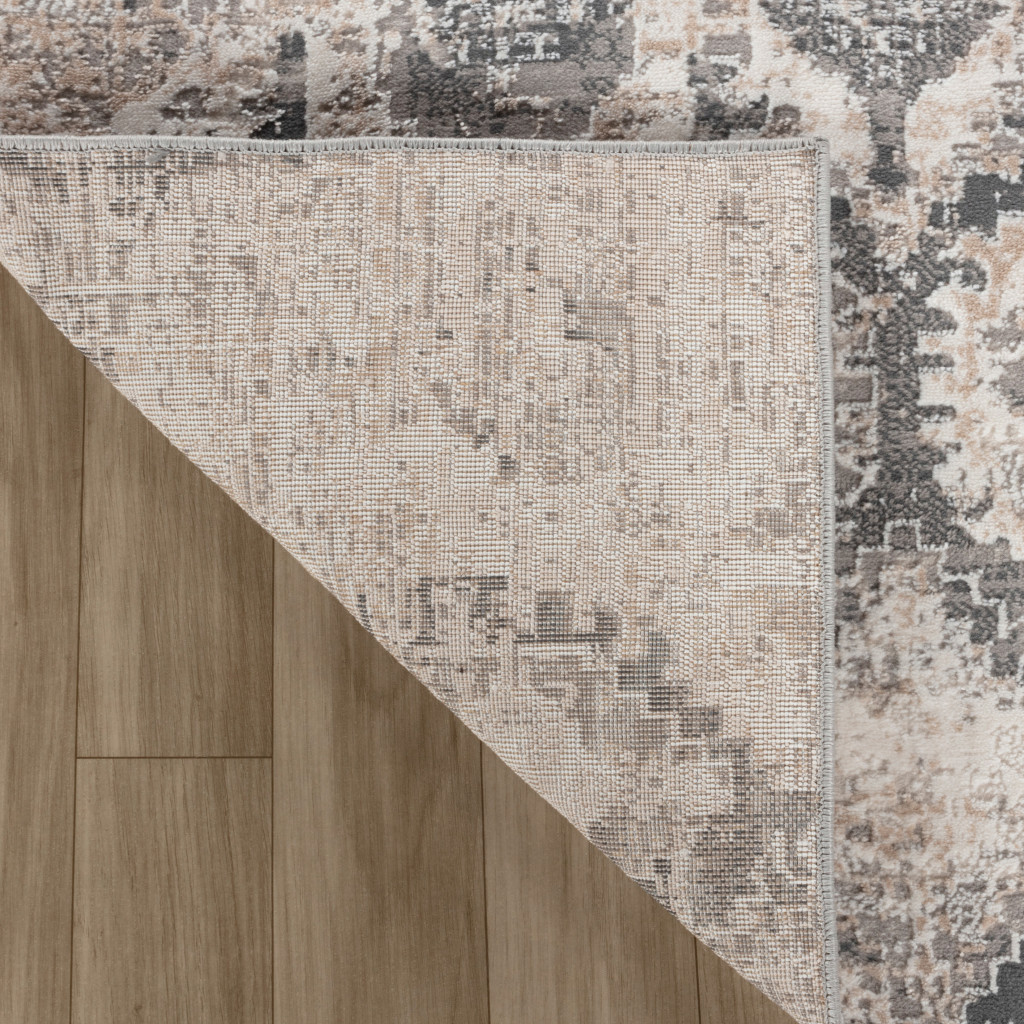 5" X 8" Beige and Gray Abstract Distressed Area Rug