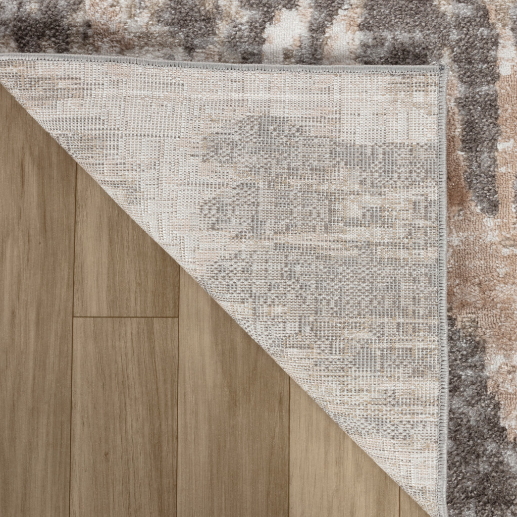 5" X 8" Beige and Brown Abstract Distressed Area Rug