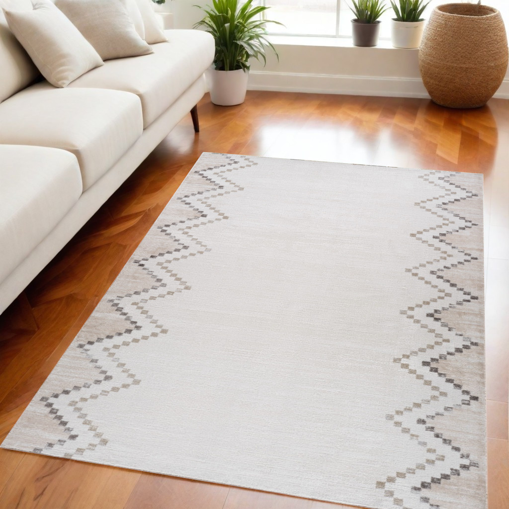 5" X 8" Beige and Brown Abstract Distressed Area Rug