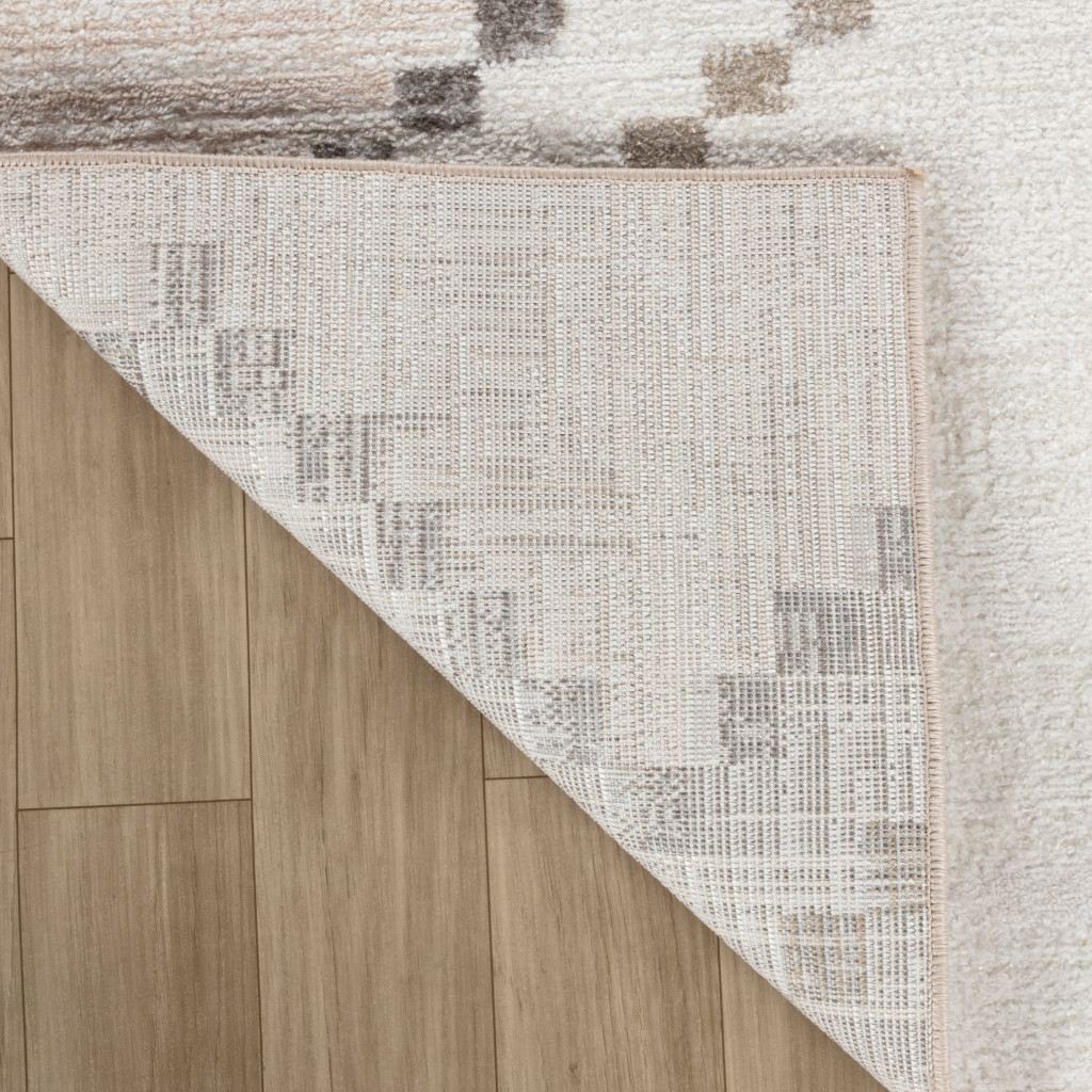 5" X 8" Beige and Brown Abstract Distressed Area Rug