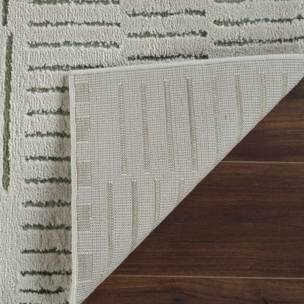 5" X 8" Cream and Green Abstract Distressed Area Rug