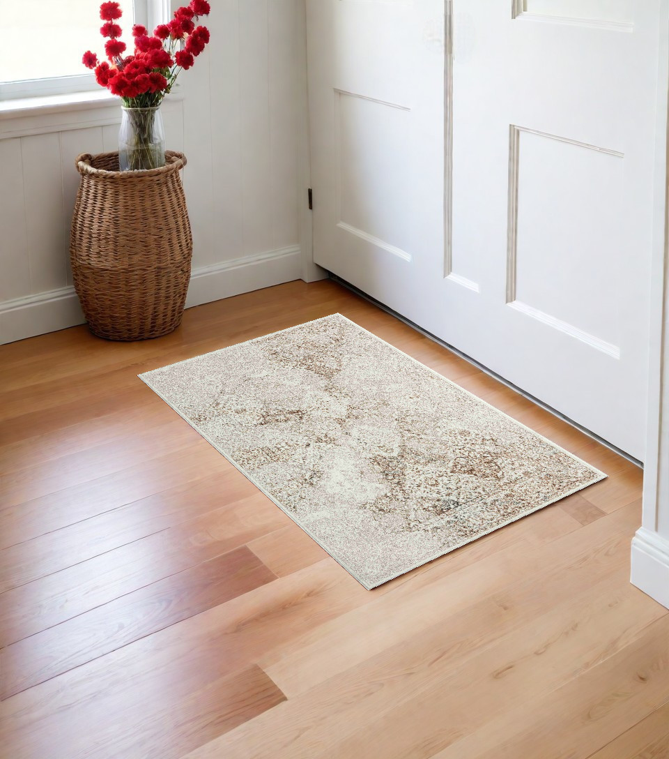 2" X 3" Beige and Ivory Damask Area Rug