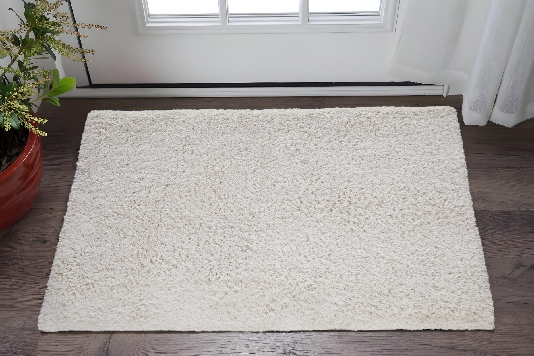 2" X 3" Ivory Shag Hand Tufted Area Rug
