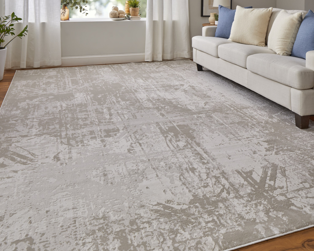 10" X 13" Taupe and Ivory Abstract Power Loom Worn Faded Area Rug