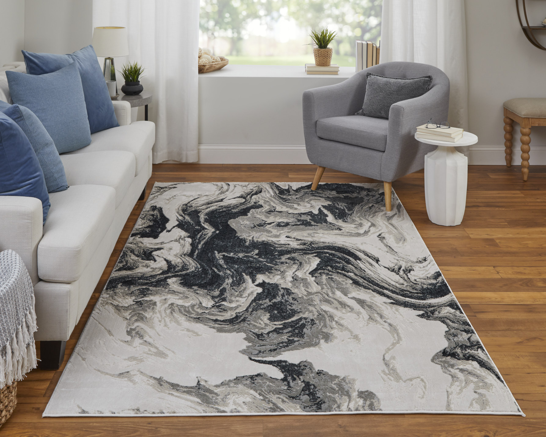 5" X 8" Ivory Black and Taupe Abstract Power Loom Area Rug