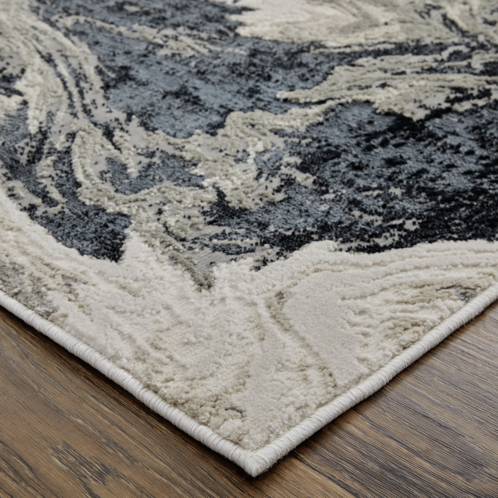 7" X 10" Ivory Black and Taupe Abstract Power Loom Area Rug